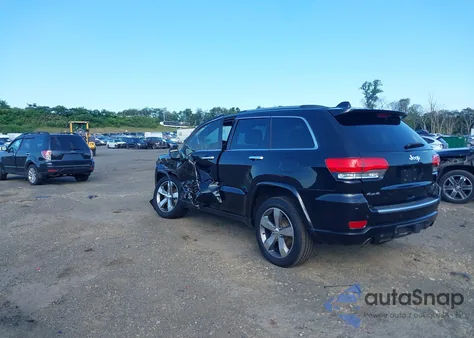 2014 Jeep Grand Cherokee Overland z USA, uszkodzony, nr VIN 1C4RJFCG3EC523356